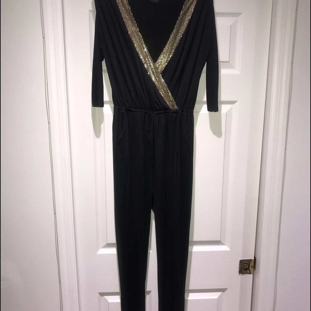 Black stretchy romper with sequins perfect for NYE